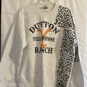 Yellowstone Ranch leopard print sweatshirt.